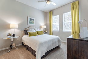 Savannah apartment for rent - A bedroom with a bed, nightstand, and window.