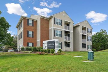 Fredericksburg apartment for rent - A CrestView apartment complex with a green lawn in front.
