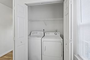 Stafford apartment for rent - A white laundry room with a washer and dryer.