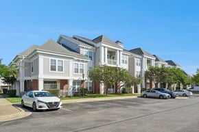 Waldorf apartment for rent - A row of townhouses with cars parked in front.
