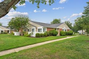 Waldorf apartment for rent - A house with a white fence and a green lawn.