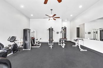 Fitness center with strength training and cardio machines