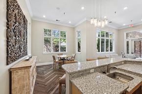 Frederick apartment for rent - A kitchen with granite countertops and a wooden floor.