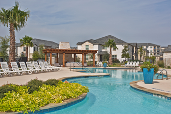 Resort-style swimming pool with sundeck