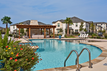 Resort-style swimming pool with sundeck