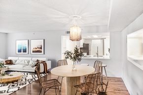 Boynton Beach apartment for rent - A modern dining room with a round table and chairs.