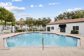 Fort Lauderdale apartment for rent - our apartments have a large swimming pool and a white building