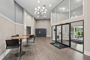 Waldorf apartment for rent - A conference room with a table, chairs, and a chandelier.