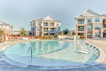 Resort-style swimming pool with sundeck