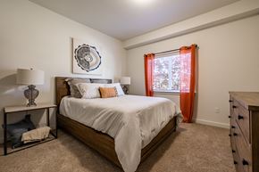 Lacey apartment for rent - bedroom with large bed and window