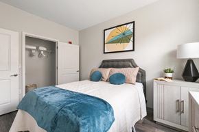 Pittsburgh apartment for rent - a bedroom with a bed and a closet