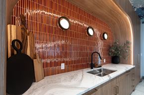 Denver apartment for rent - A kitchen with a wooden counter and a sink.