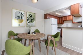 Azusa apartment for rent - A dining room with a table and chairs.