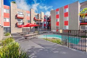 Los Angeles apartment for rent - our apartments have a pool and a patio with tables and umbrellas