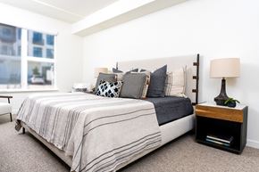Livermore apartment for rent - a bedroom with white walls and a large window