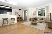 Cupertino apartment for rent - A living room with a bar area and a couch.
