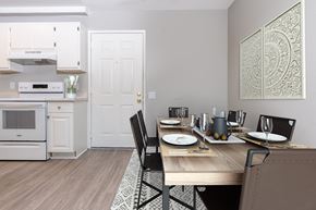 Santa Ana apartment for rent - A dining room with a table set for two.