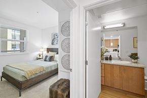 Milpitas apartment for rent - The Edge Milpitas CA a bedroom with a bed and a sink in a room