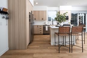 University Place apartment for rent - A kitchen with a table and chairs.