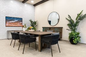 Montclair apartment for rent - A dining room with a wooden table and chairs.