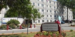 Lorain apartment for rent - a sign for the international plaza in front of a building
