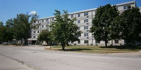 Elyria apartment for rent - an apartment building on the corner of an empty street