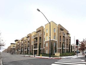 Milpitas apartment for rent - a street corner with a street light and some buildings