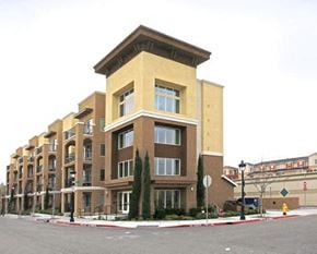 Milpitas apartment for rent - a tall building with a street in front of it