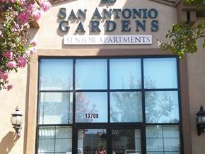 Norwalk apartment for rent - the facade of a building with a sign gardens