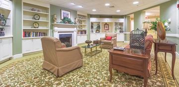 Anaheim apartment for rent - a living room filled with furniture and a fireplace