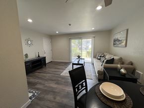 Lynnwood apartment for rent - A dining room with a black table and chairs.