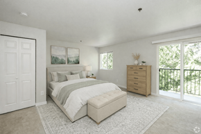 Everett apartment for rent - A bedroom with a large bed and a dresser.