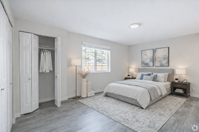 Lynnwood apartment for rent - A bedroom with a large bed and a window.
