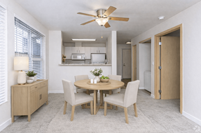 Seattle apartment for rent - A dining room with a round table and chairs.