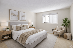 Seattle apartment for rent - A bedroom with a large bed and a chair.
