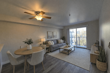 Seattle apartment for rent - A living room with a dining table and chairs.