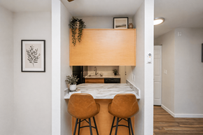 Edmonds apartment for rent - A kitchen with a table and two chairs.