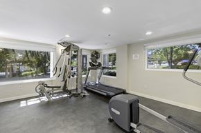 Bellevue apartment for rent - Fitness Facilities with a Treadmill, Weights, and Oversized Windows for an Abundance of Light  at Sir Gallahad Apartment Homes, Bellevue, WA