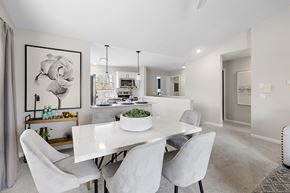 Commerce Township apartment for rent - A dining room with a white table and chairs at Briarcliff Village, Michigan, 48390