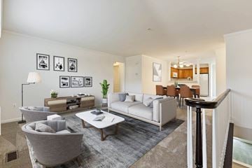 Rochester Hills apartment for rent - a living room with a couch and a table