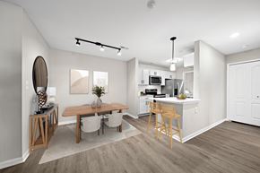 Canton apartment for rent - A modern kitchen with a dining table and chairs.