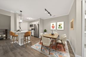 Canton apartment for rent - A modern kitchen with a dining table and chairs.
