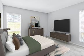 Greensboro apartment for rent - Bedroom with a bed and a television at Lakes Edge Apartments, Greensboro, North Carolina