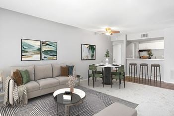 A living room with a couch and a table