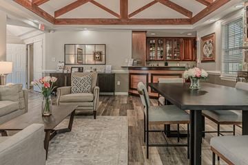 Springfield apartment for rent - A well-lit, spacious kitchen and living room with a dining table and chairs.