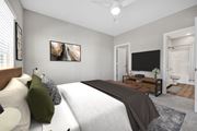 Columbia apartment for rent - A bedroom with a large bed and a flat screen TV.