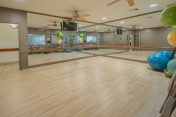 24-Hour fitness center with studio and sauna