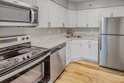 Leesburg apartment for rent - White cabinetry in kitchen at Tuscarora Creek, Leesburg, Virginia