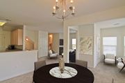 Manassas apartment for rent - A dining room with a round table and chairs. at Barrington Park Apartments, Manassas, 20110