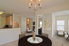 Manassas apartment for rent - A dining room with a round table and chairs. at Barrington Park Apartments, Manassas, 20110